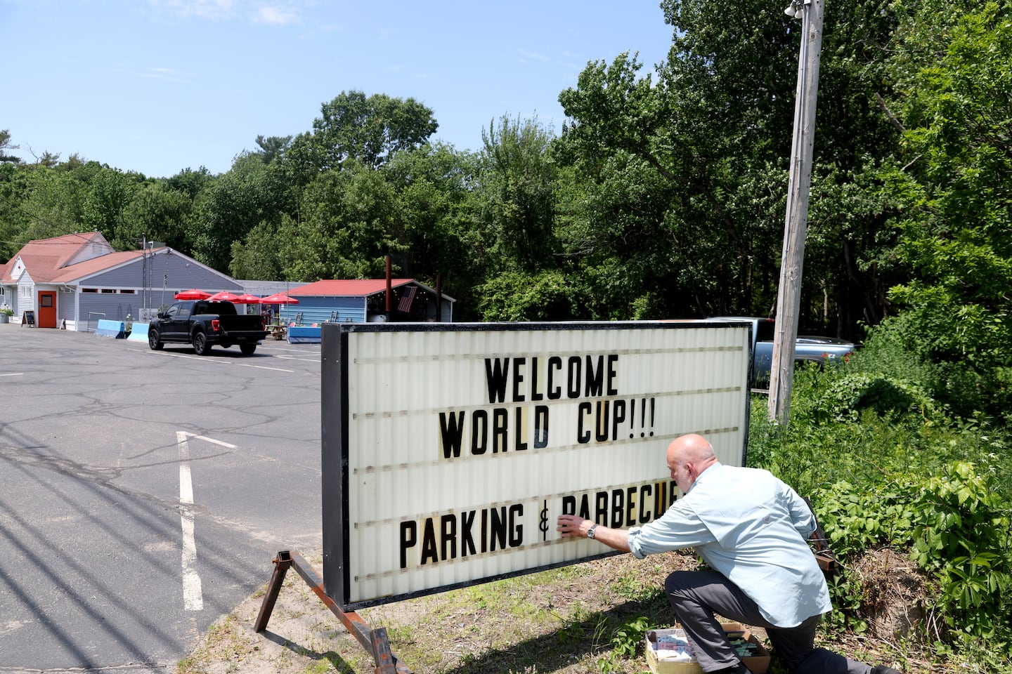 World Cup parking is turning driveways, church lots and city spaces into gold